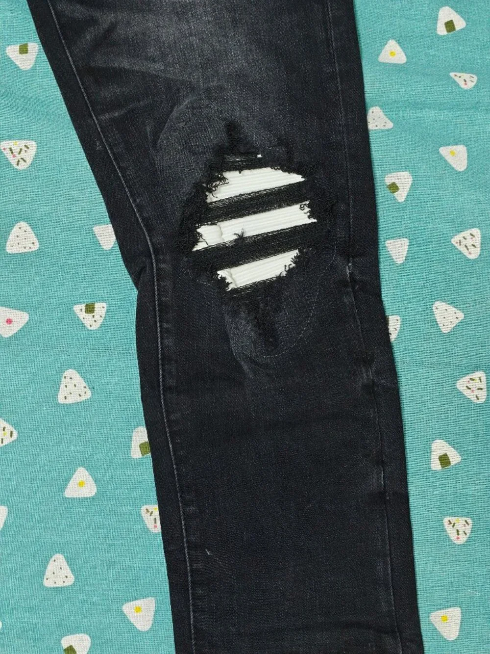 AMIRI Black Distressed Skinny Jeans with Knee Rips